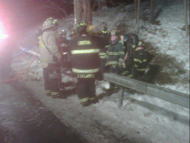 1/9/11 - Members operating at a rollover with entrapment on Route 129.