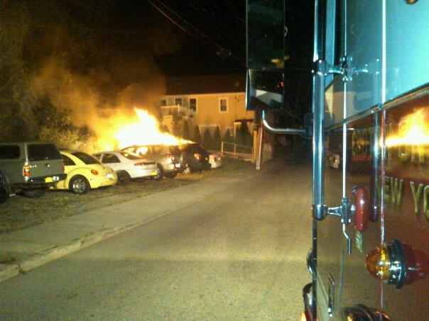 9/4/11 - A contractor for Con Edison caused a phone pole to snap, bringing down electrical lines, which caused two cars to catch fire on Brook Street.