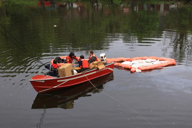 4/27/10 - Attempting to flee police, a stolen car was driven into the Croton River at Van Cortlandt Manor. M32 assists with containing spilled fluids.