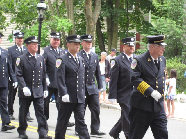 Members of the Croton Fire Department marching  in the 2011 Summerfest Parade.