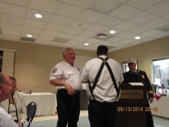 2014 Annual Inspection - Captain Goe & Engr. Karpoff receiving the Best Overall Apparatus award for Rescue 18.