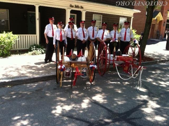 Members of the CFD with &quot;Yesterday's Fires'&quot; hose carts.  Photo by J. Powers