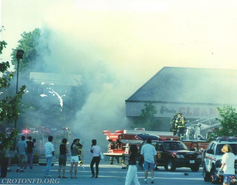 A fire heavily damaged Pircio Cleaners on Maple Street, 2001.  In this photo is E119 (retired in 2006) and Ladder 44 (retired in 2002). 
